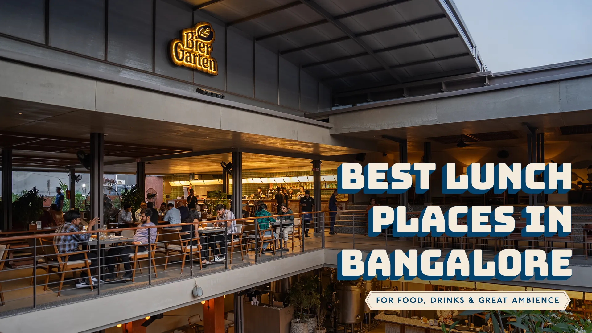 Customers enjoying food and drinks at BierGarten, one of the premier outdoor seating restaurants and best lunch places in Bangalore with good ambience.